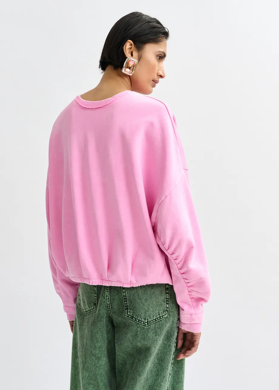 Roze korte sweater met wikkeldetail
