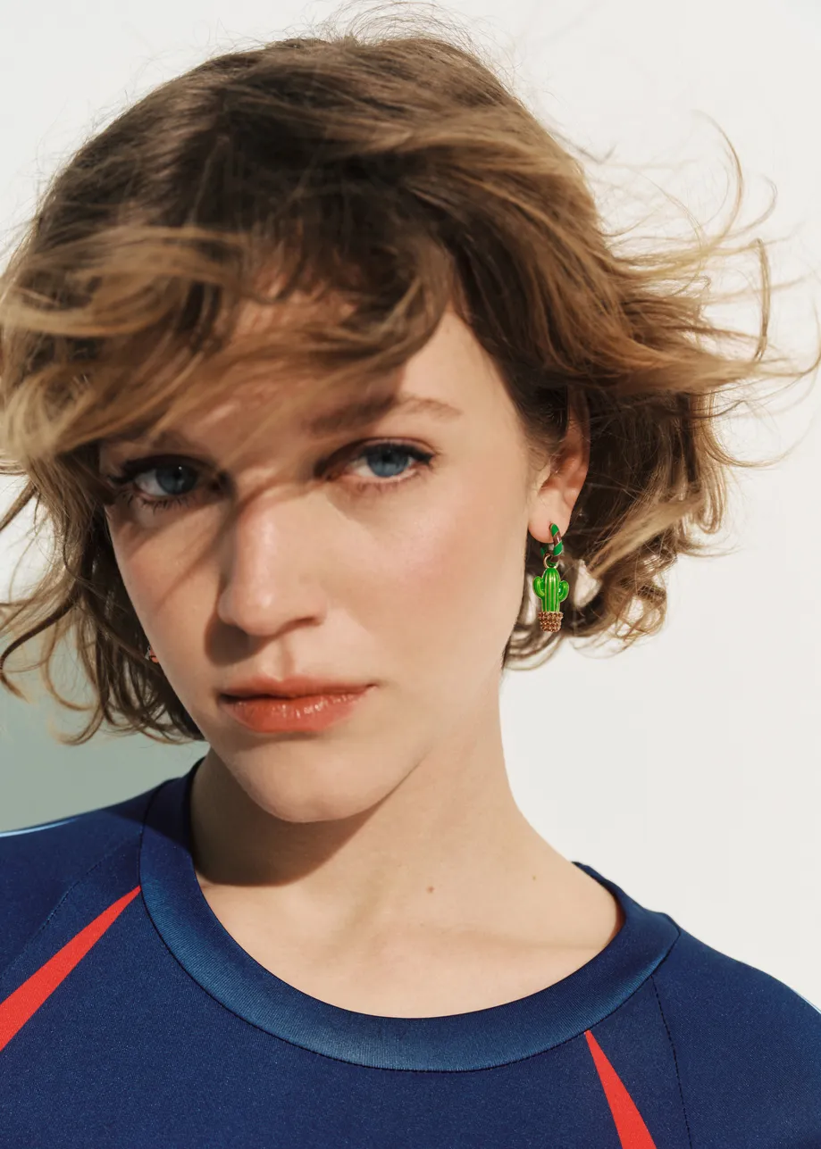 Green and brown hoop earrings with Snoopy and cactus