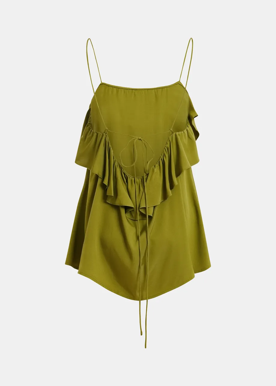 Groen topje met volant en lint op de rug