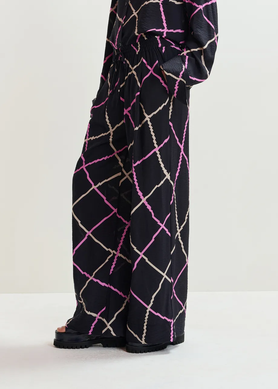 Zwart, roze en beige geruite broek met brede pijp