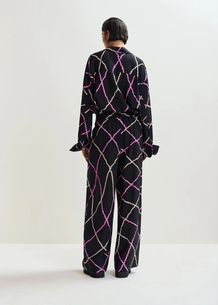 Zwart, roze en beige geruite broek met brede pijp