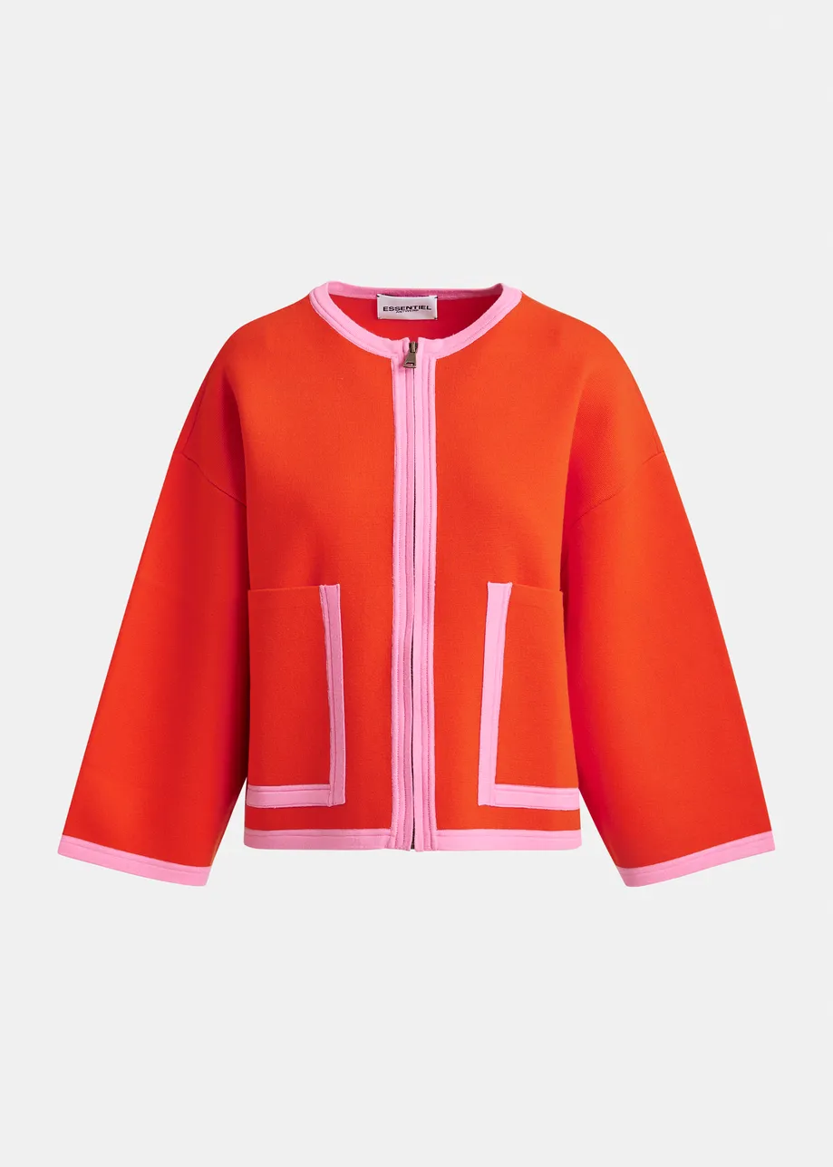 Bright orange and pink cardigan with contrasting trims and zip fastening