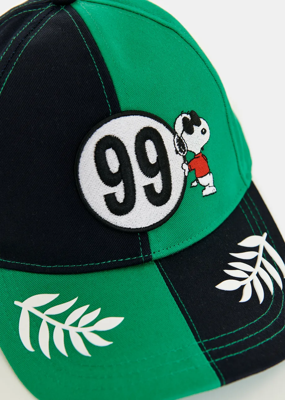 Green, black and white Peanuts™ Snoopy color-block cotton cap