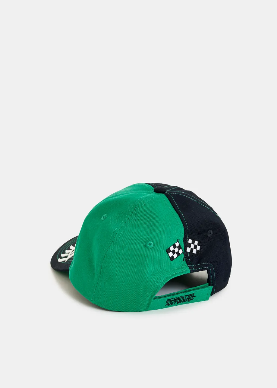 Green, black and white Peanuts™ Snoopy color-block cotton cap