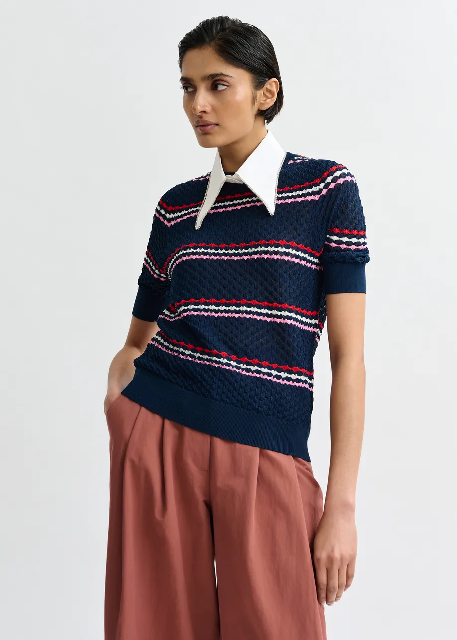 Marineblauw en veelkleurig gestreepte polo met honinggraatstructuur en sierkraag