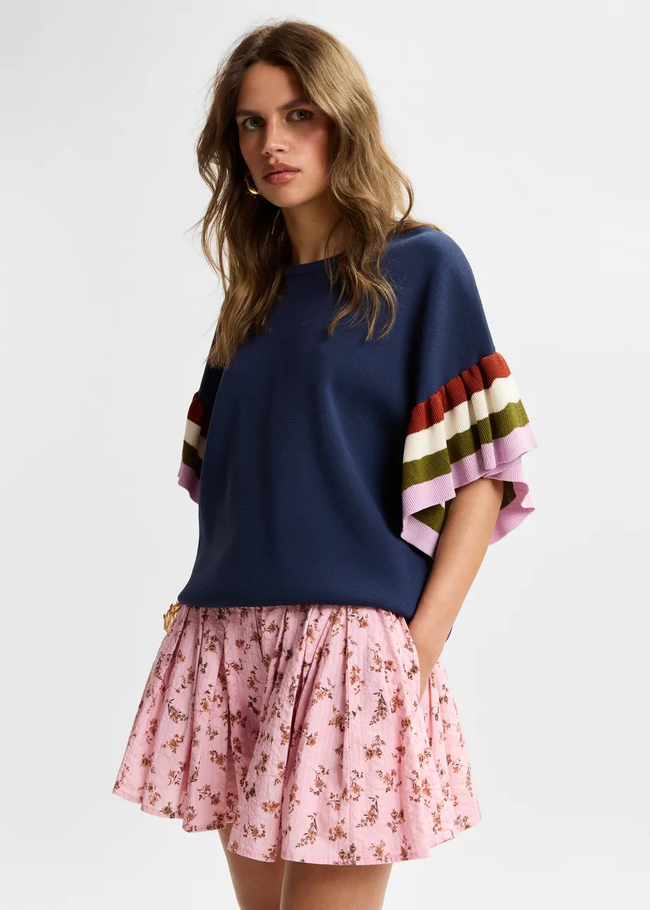 Navy knitted top with multicolored striped layered sleeves 