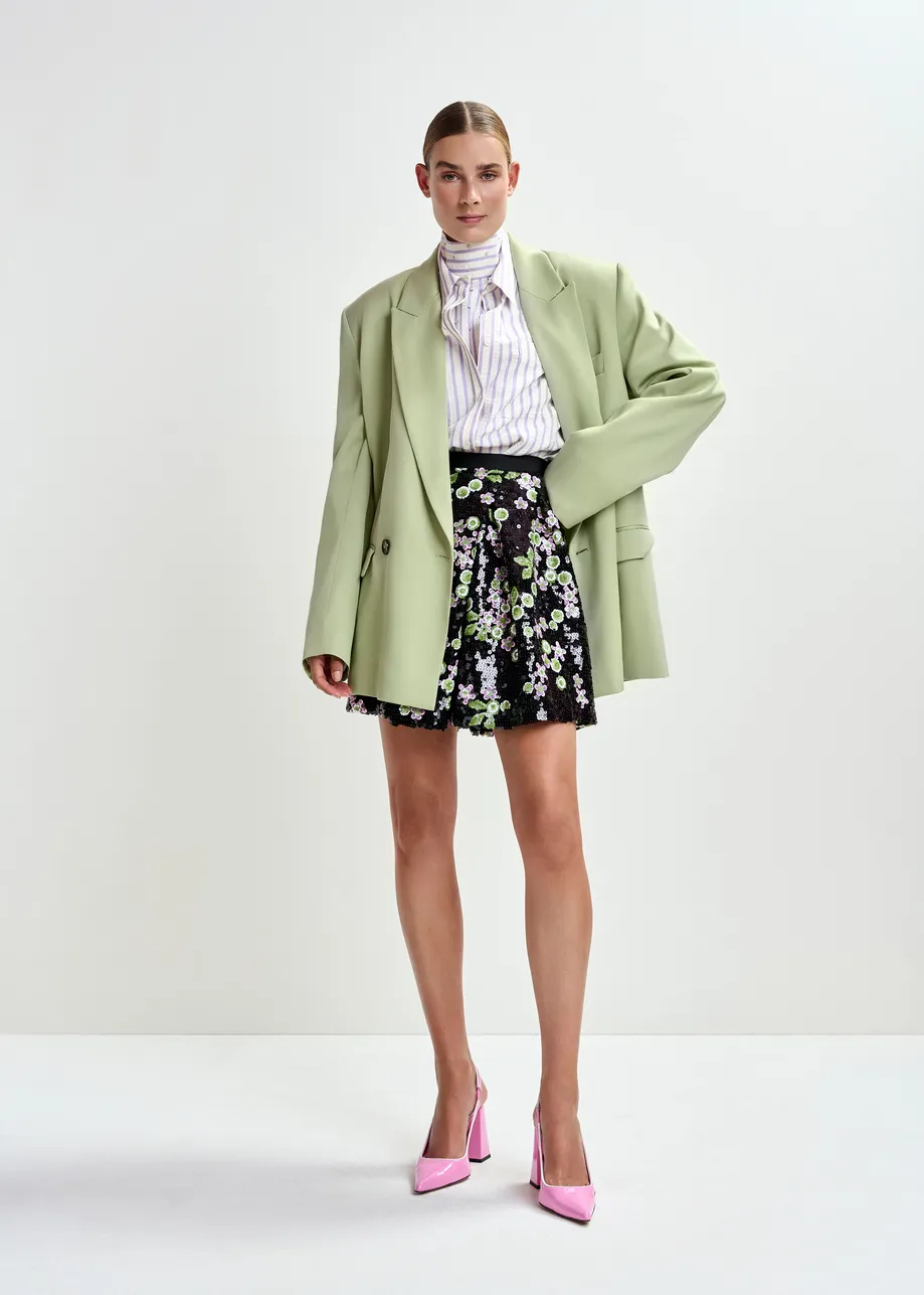 Zwarte mini-tulprok met groene en roze pailletten