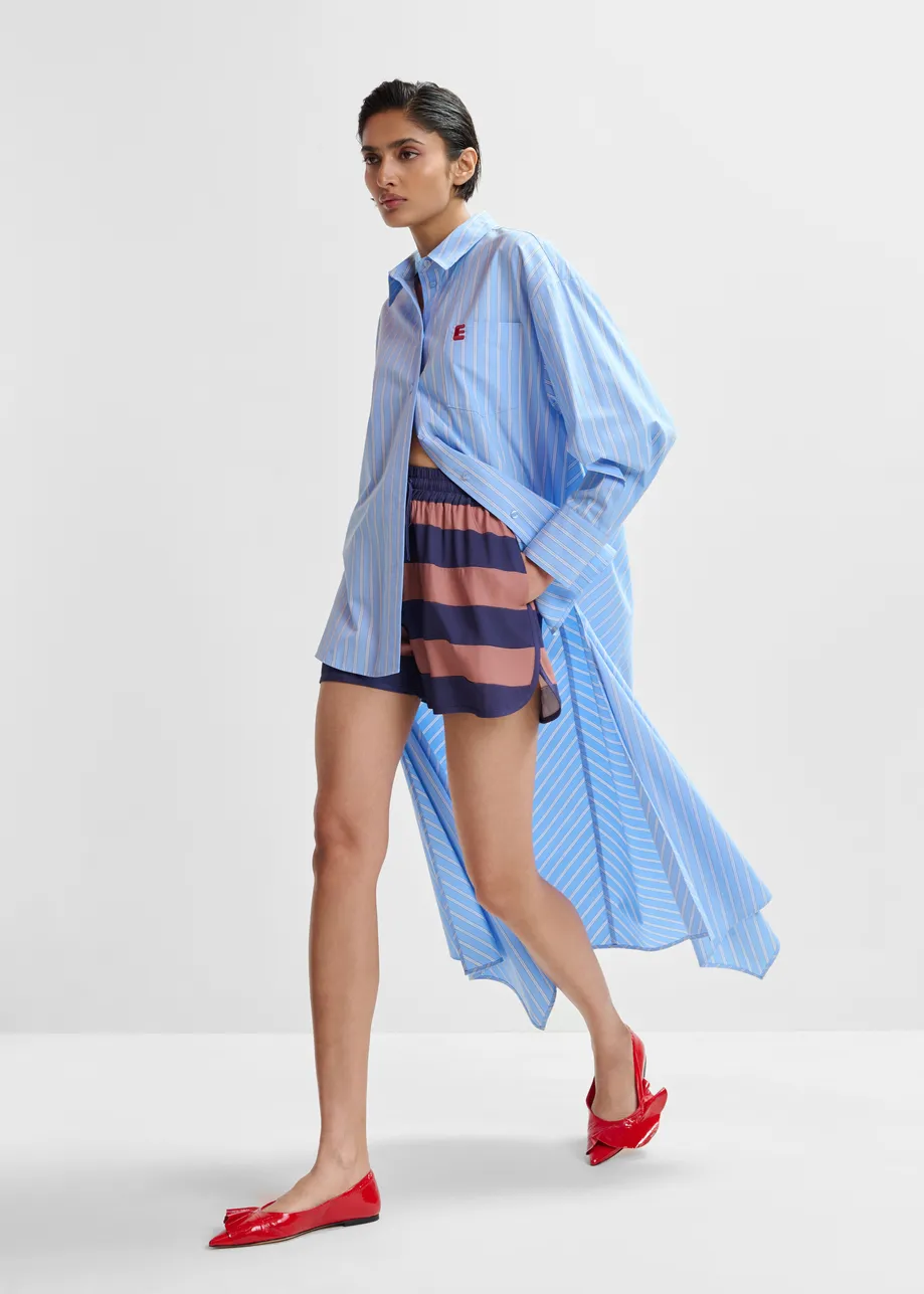 Light blue and white oversized cotton shirt with transformable tie detail