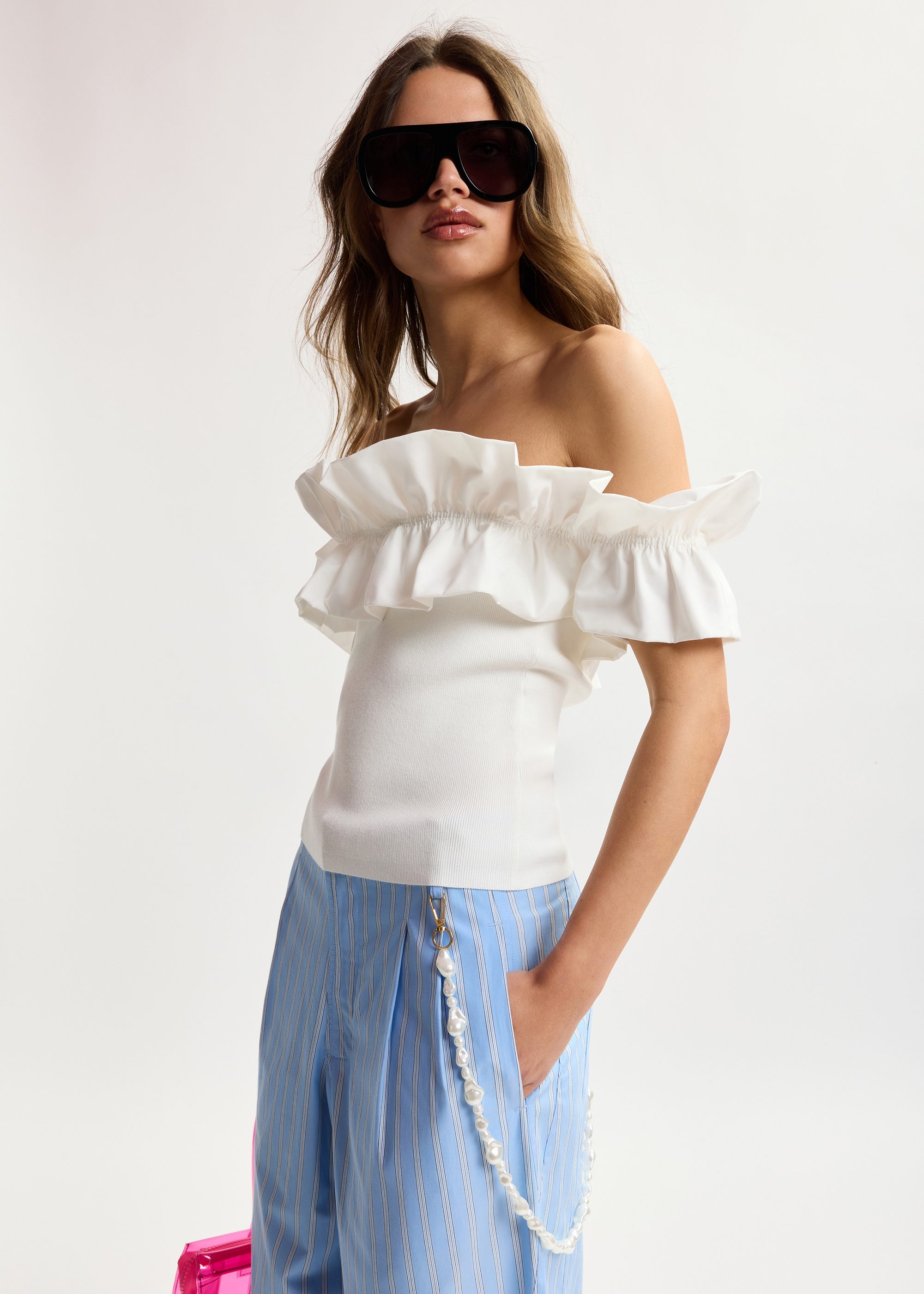 White off-shoulder knit top with ruffle trim | Essentiel Antwerp