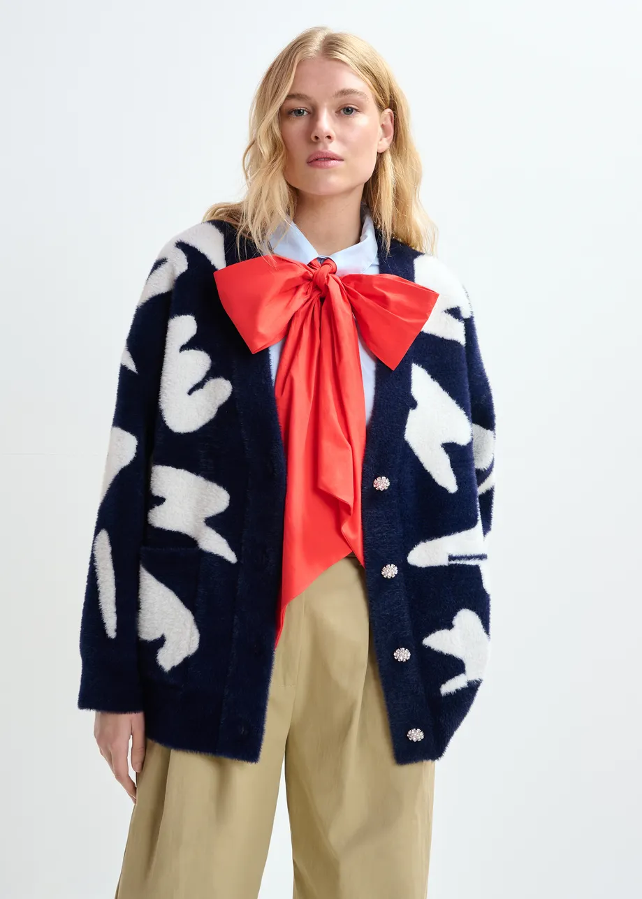 Navy cardigan with white letter print and rhinestone buttons