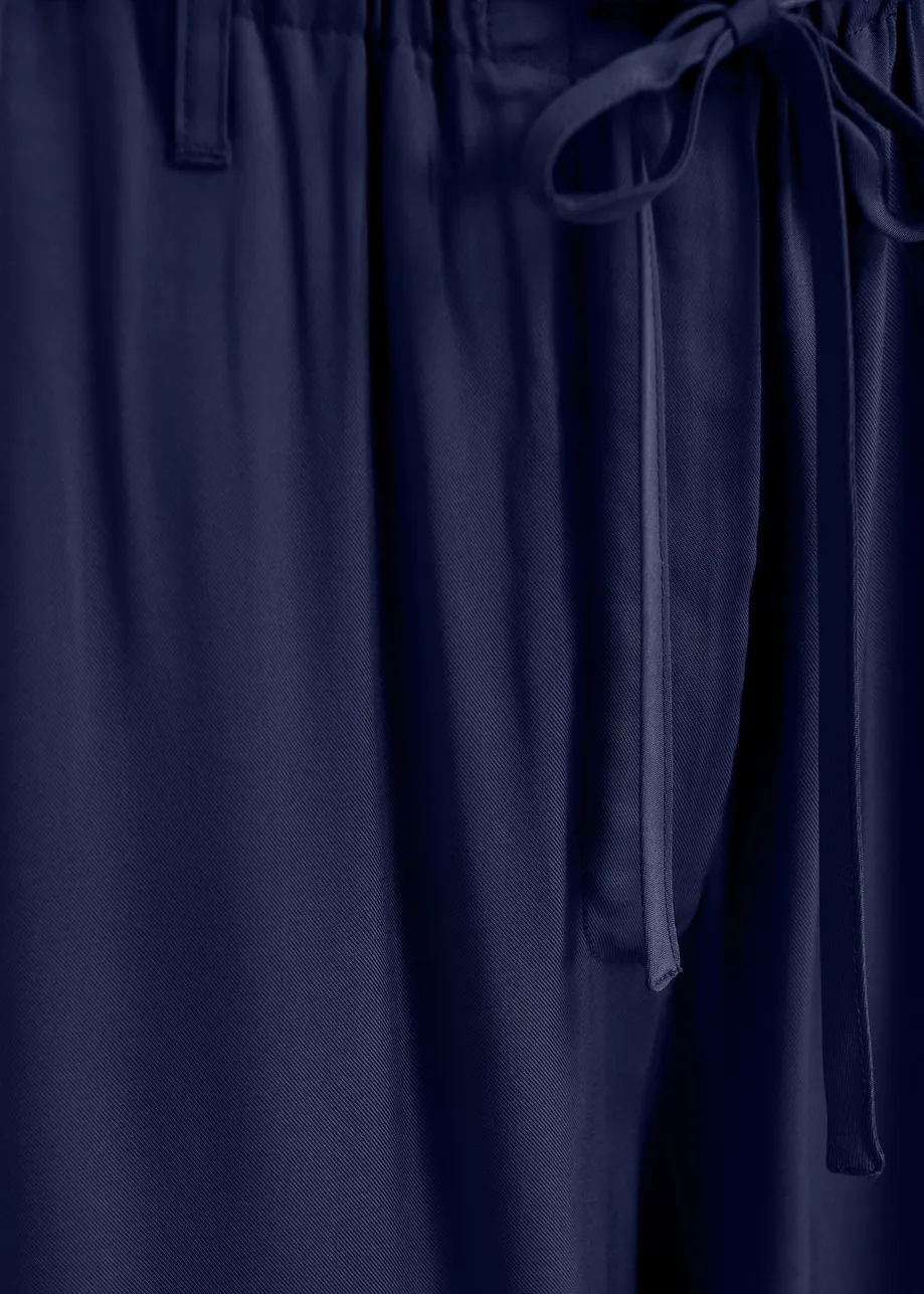 Pantalon décontracté bleu foncé à cordon de serrage dans l'ourlet