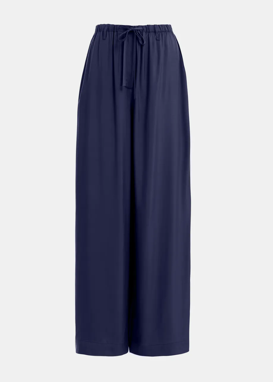 Pantaloni blu scuro dalla vestibilità comoda con coulisse sull'orlo