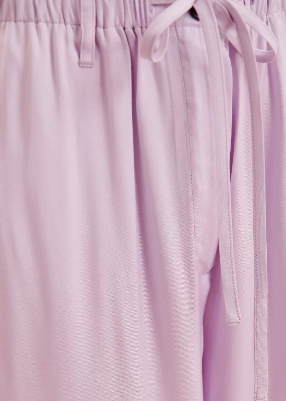 Fliederfarbene Hose mit lockerer Passform und Kordelzug