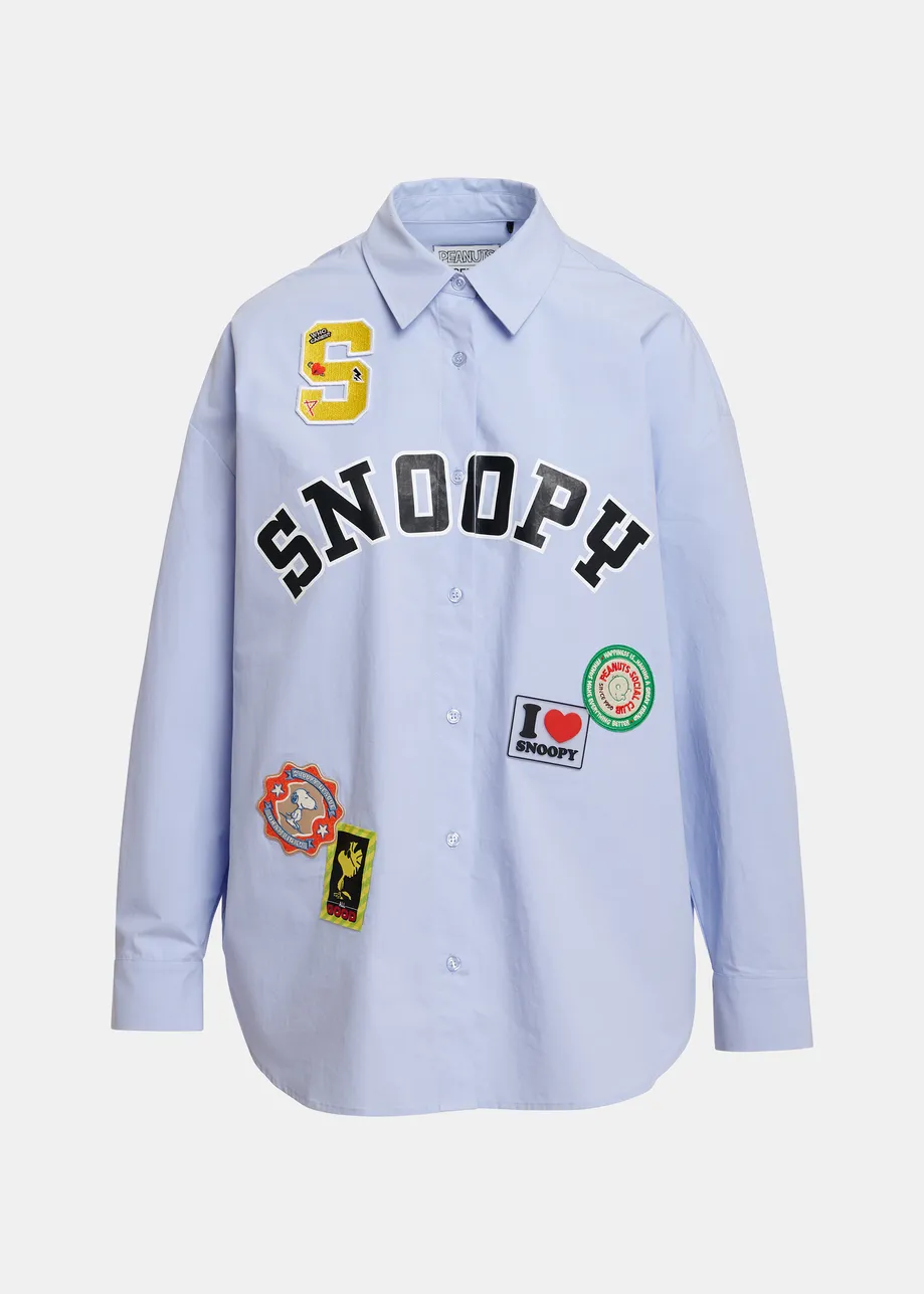 Light blue cotton shirt with multicolored Peanuts™ Snoopy patches