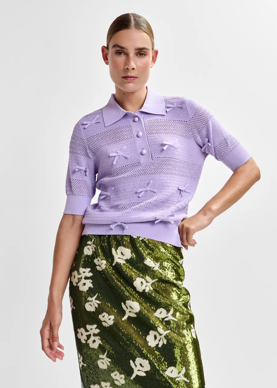 Paarse polo in tricot met strikjes