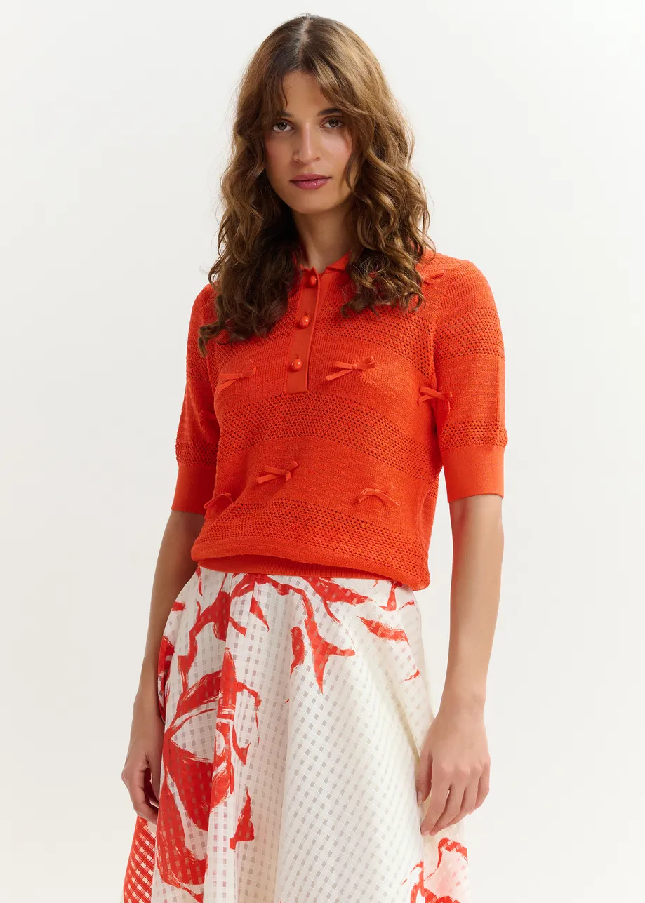 Polo en maille à nœuds rouge
