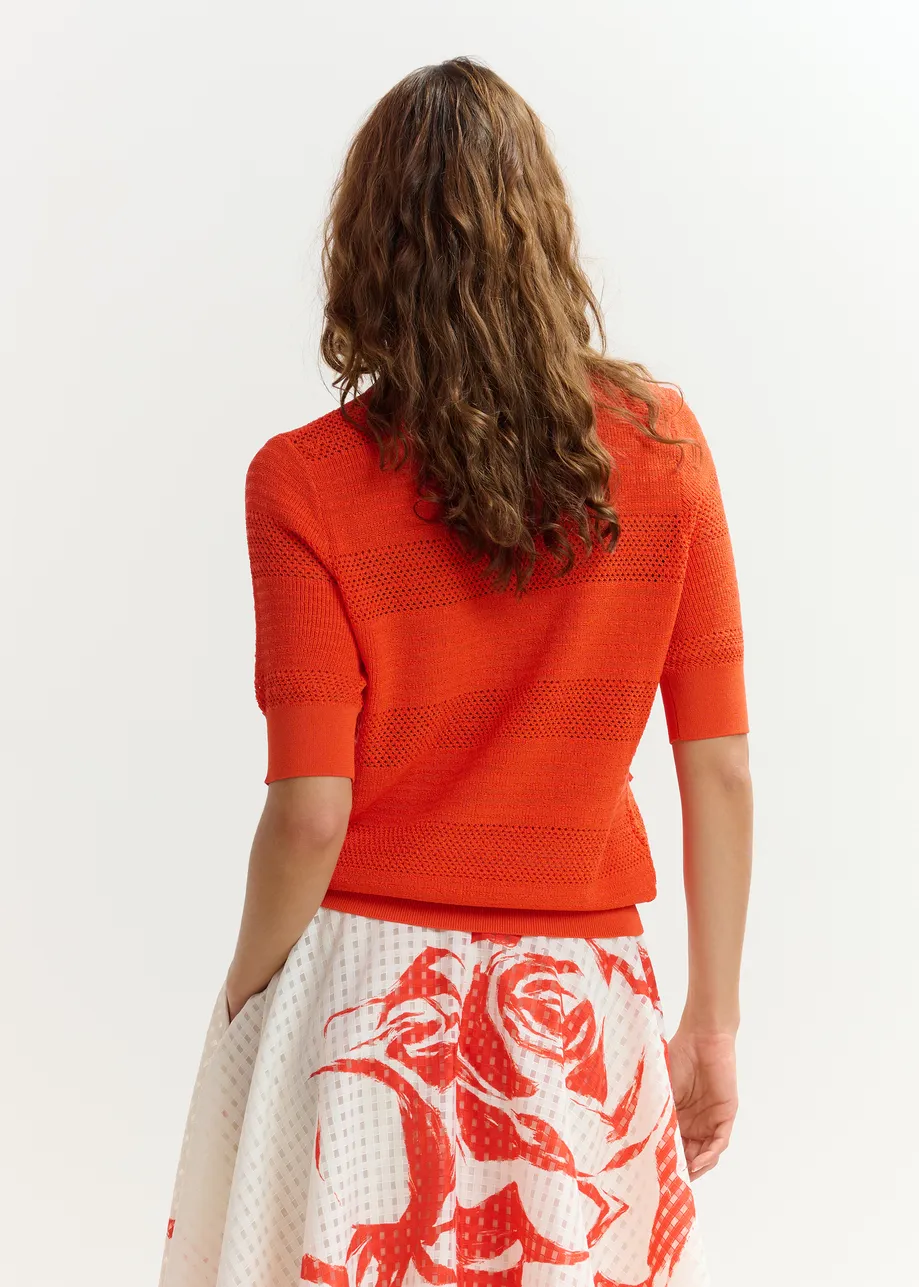 Polo en maille à nœuds rouge