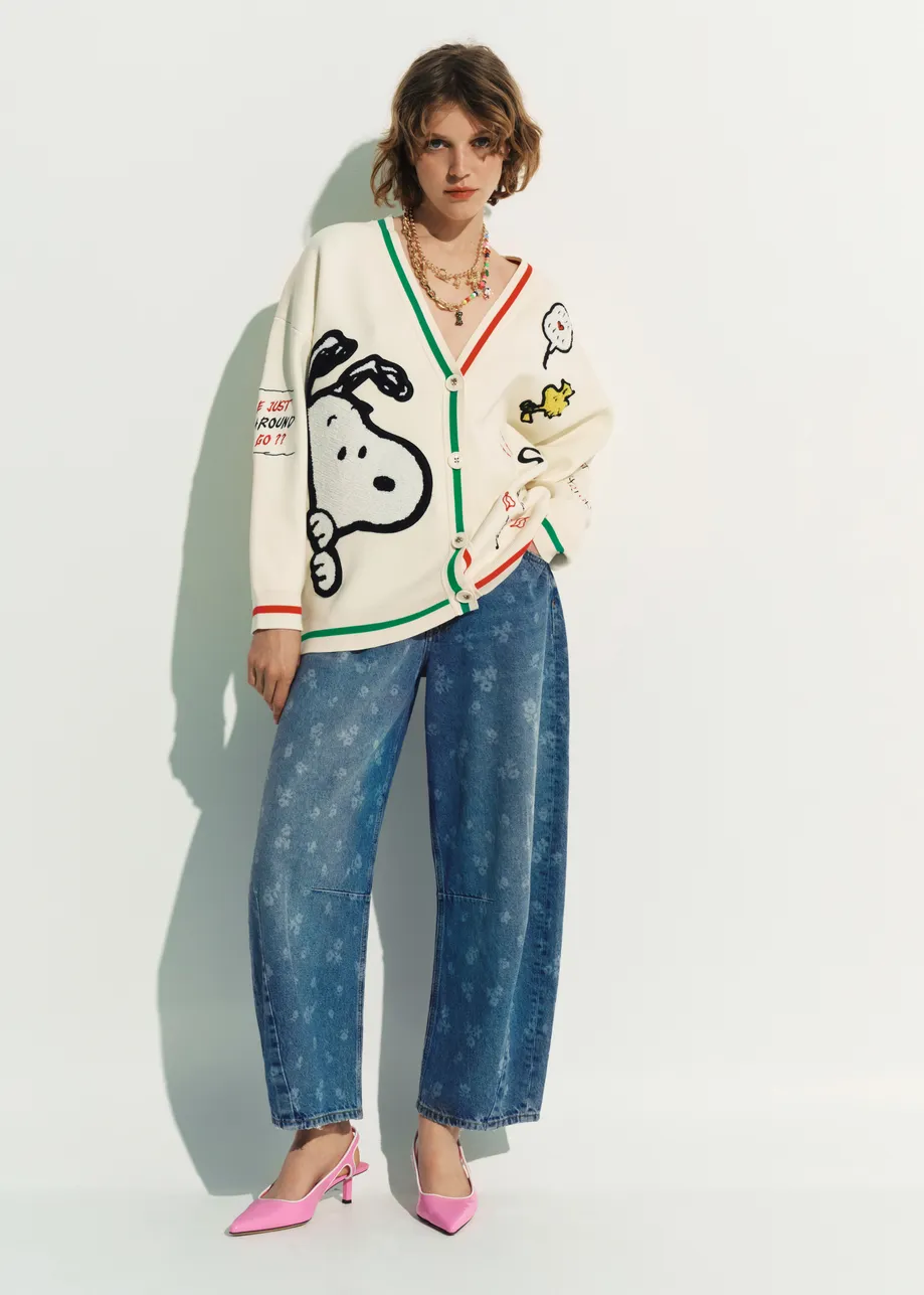Off-white knit cardigan with multicolored Peanuts™ Snoopy and Woodstock patches