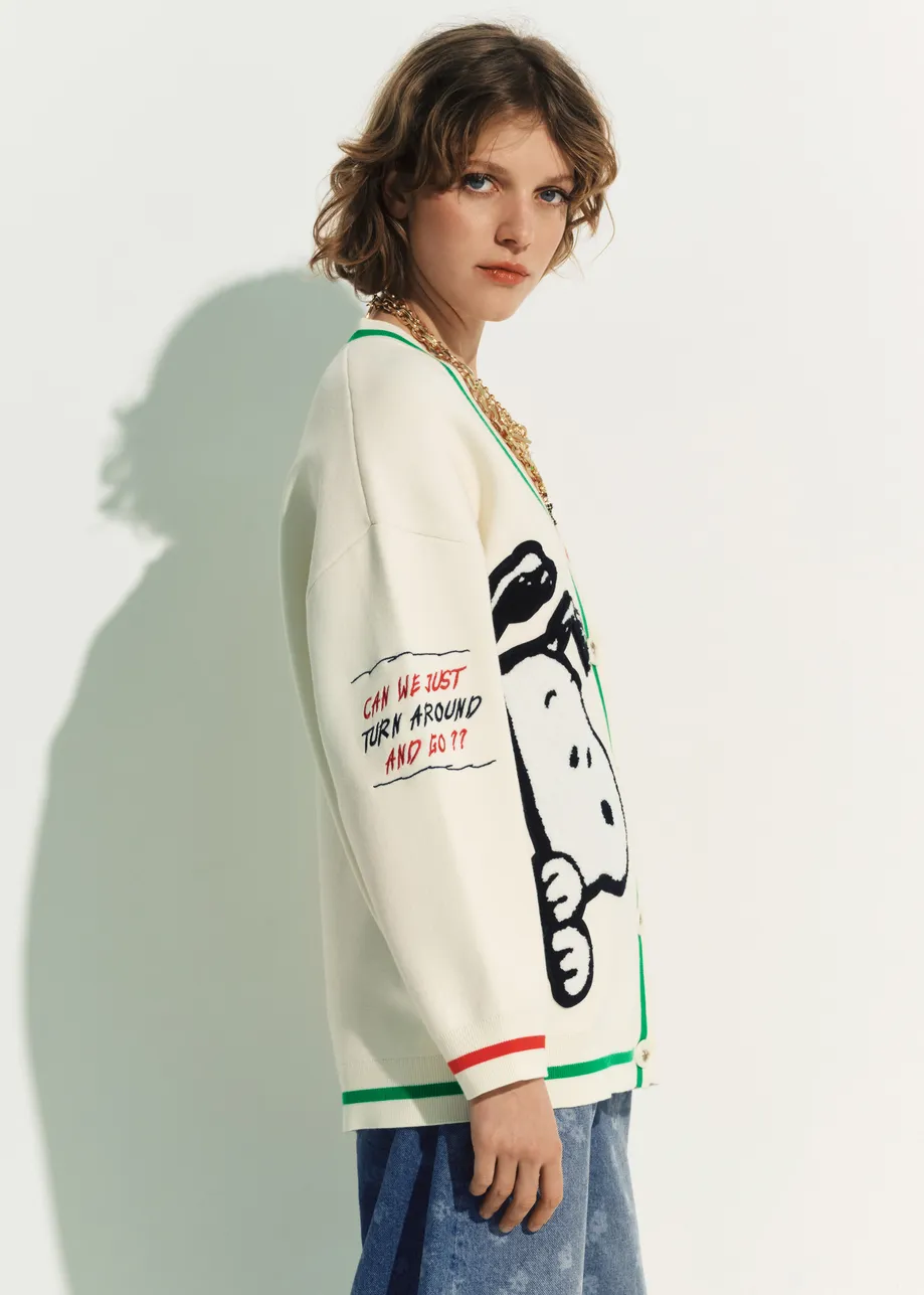 Off-white knit cardigan with multicolored Peanuts™ Snoopy and Woodstock patches