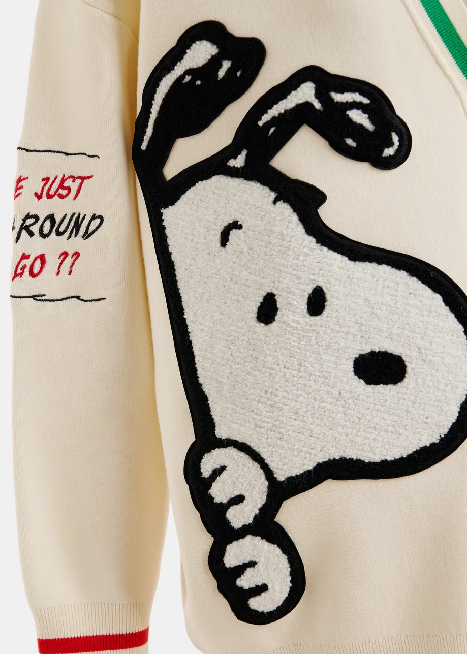 Off-white knit cardigan with multicolored Peanuts™ Snoopy and Woodstock patches
