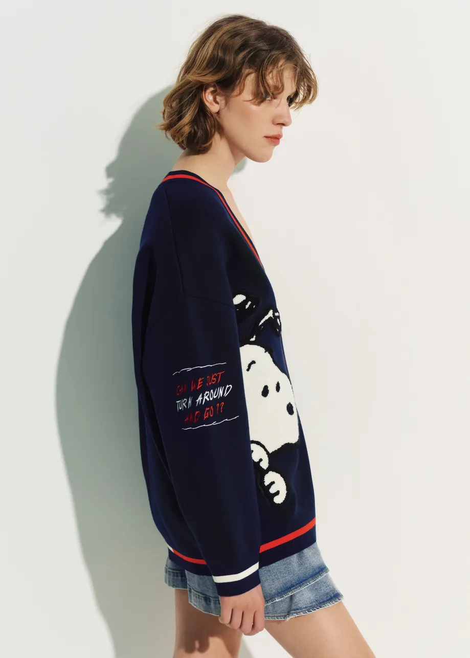 Navy knit cardigan with multicolored Peanuts™ Snoopy and Woodstock patches