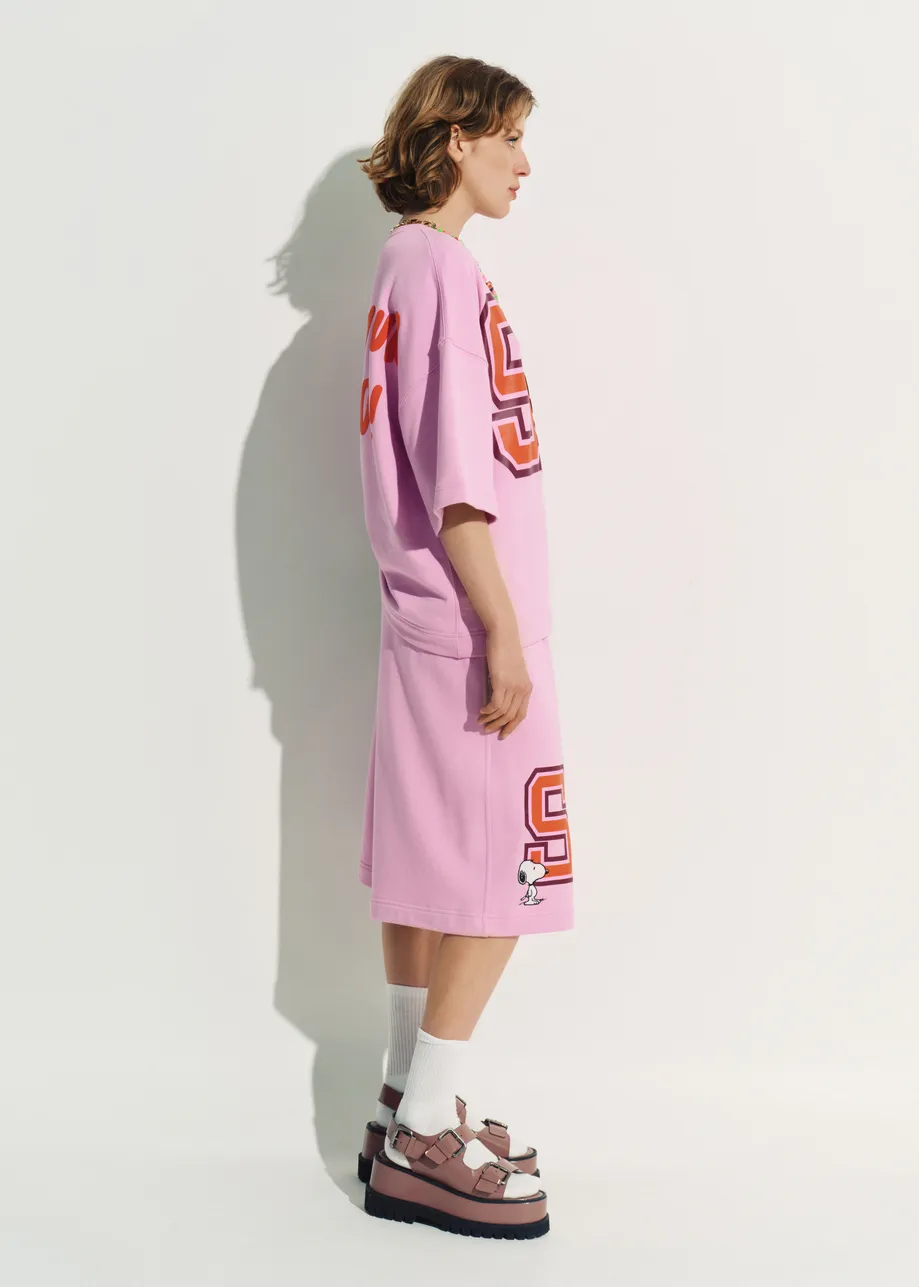 Pink cotton-blend Peanuts™ shorts with letter appliqué