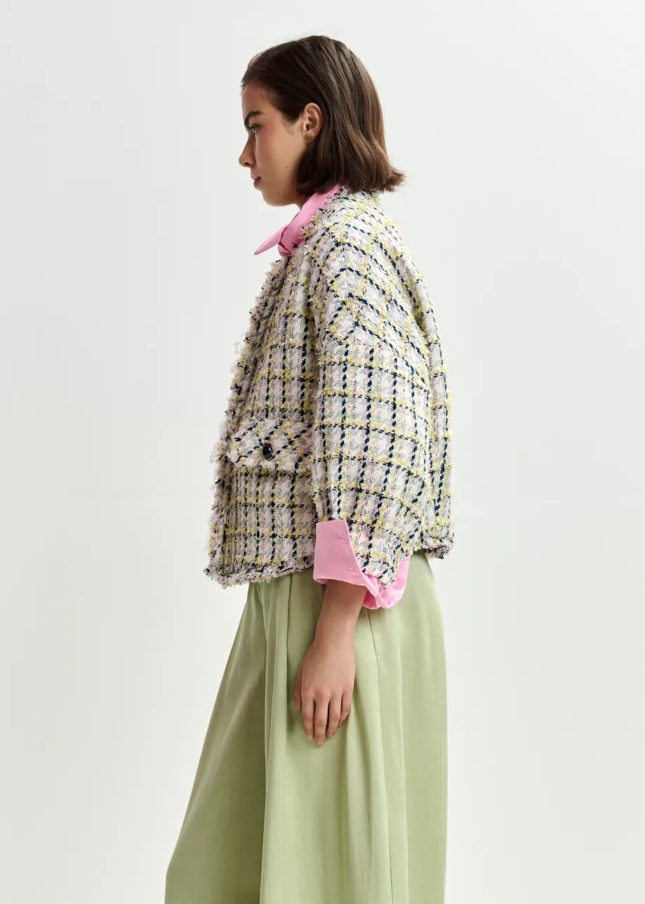 Oversized jas in bouclé met boorddetails