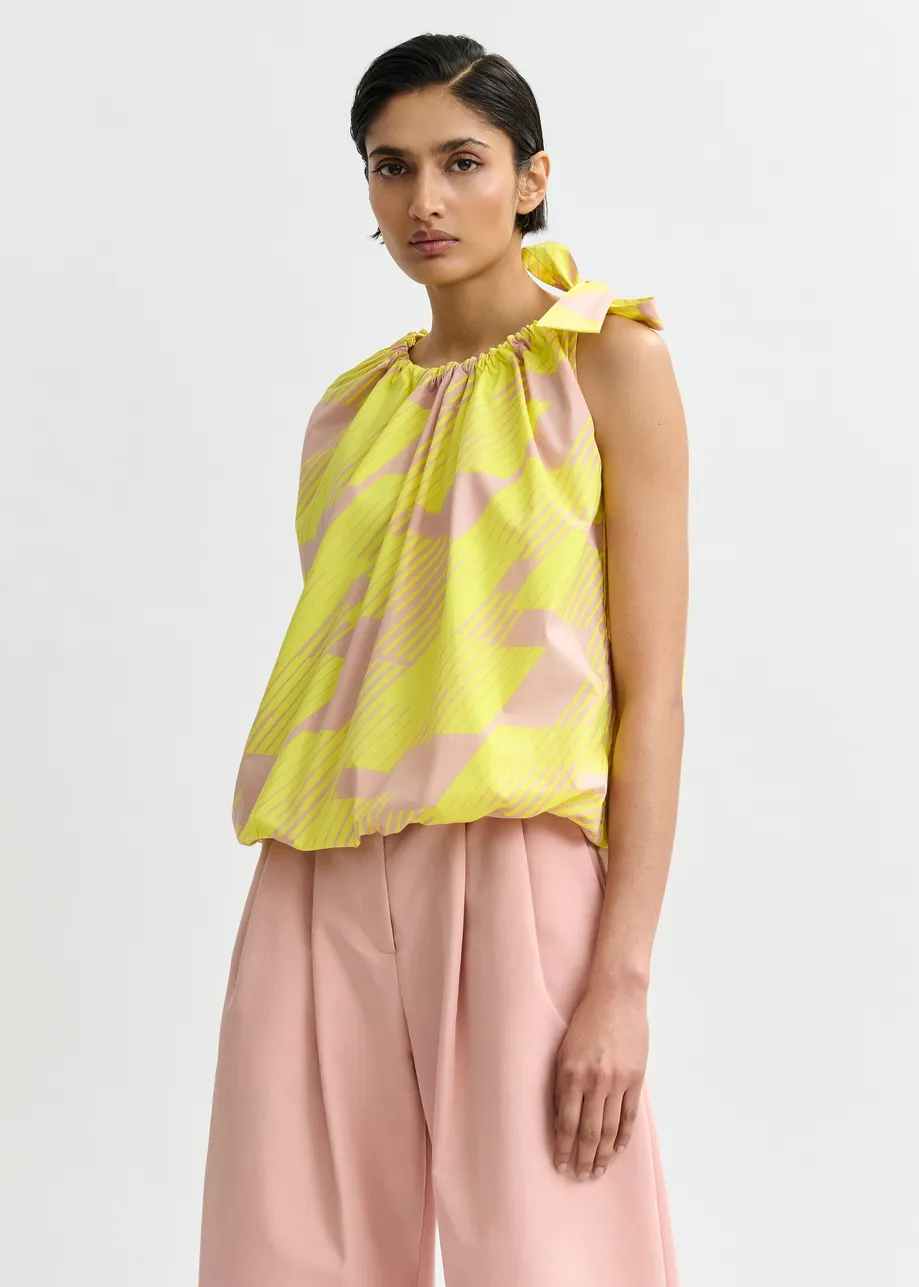 Light pink and yellow asymmetric top with neck tie ribbon