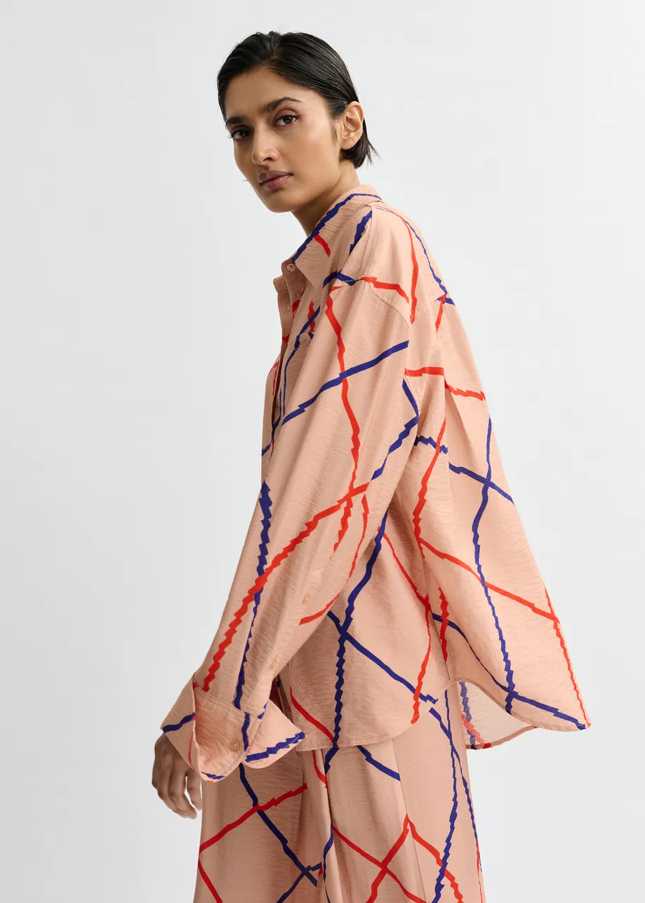 Lichtroze, rood en blauw ruitjeshemd