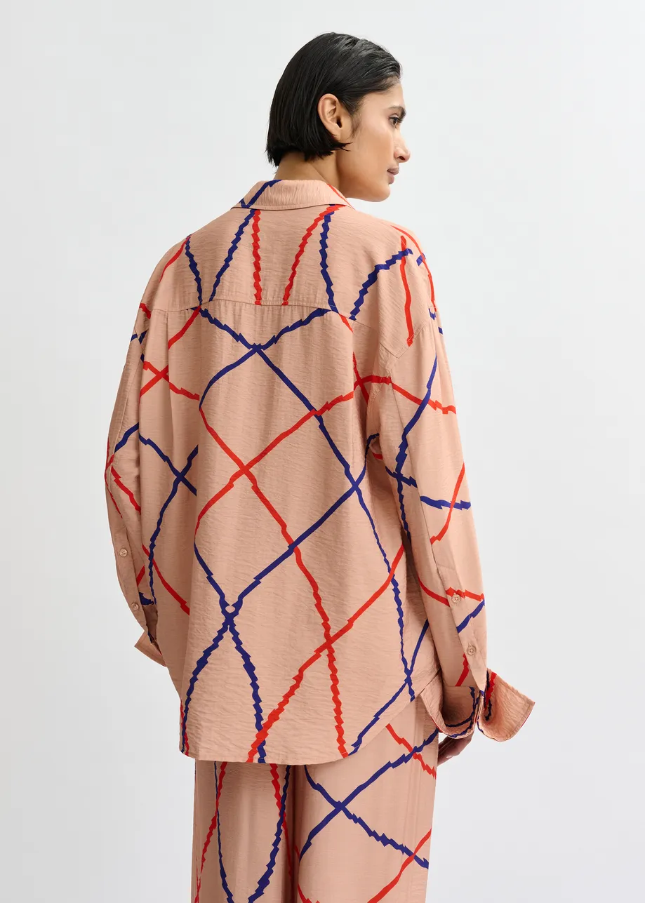 Lichtroze, rood en blauw ruitjeshemd