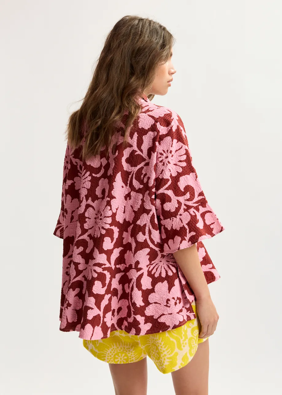 Camicia in cotone stile peplo rosa e rosso scuro con colletto a contrasto