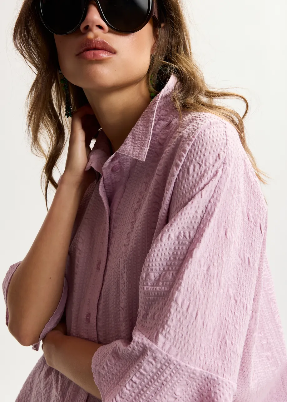 Light pink peplum cotton shirt with contrasting collar