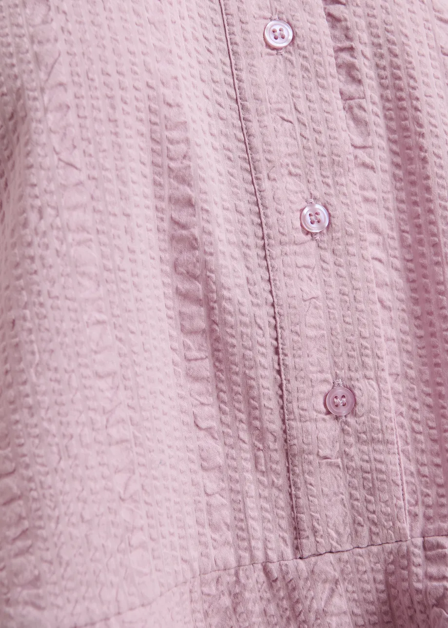 Light pink peplum cotton shirt with contrasting collar