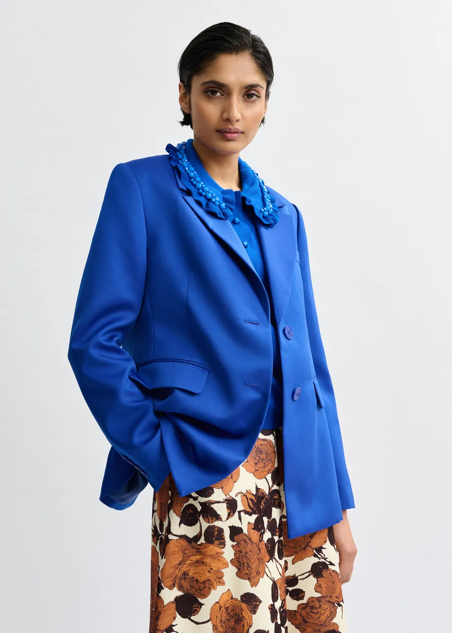 Blauwe blazer met enkele knopenrij