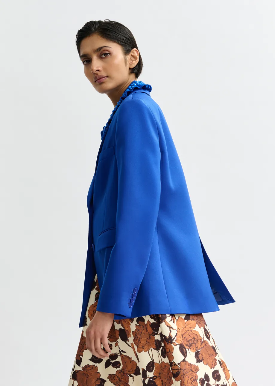 Blauwe blazer met enkele knopenrij
