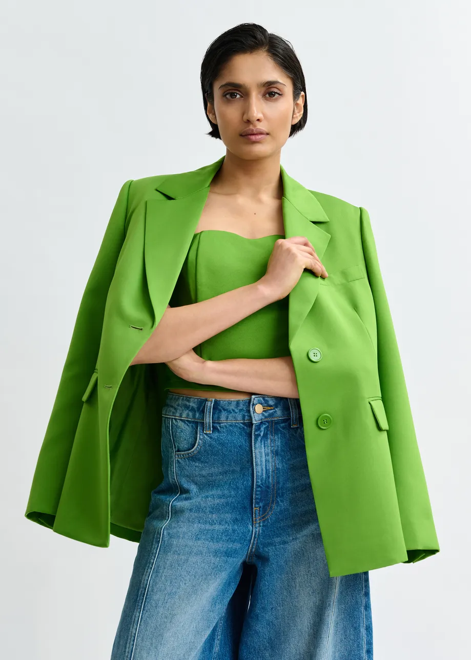 Groene blazer met enkele knopenrij