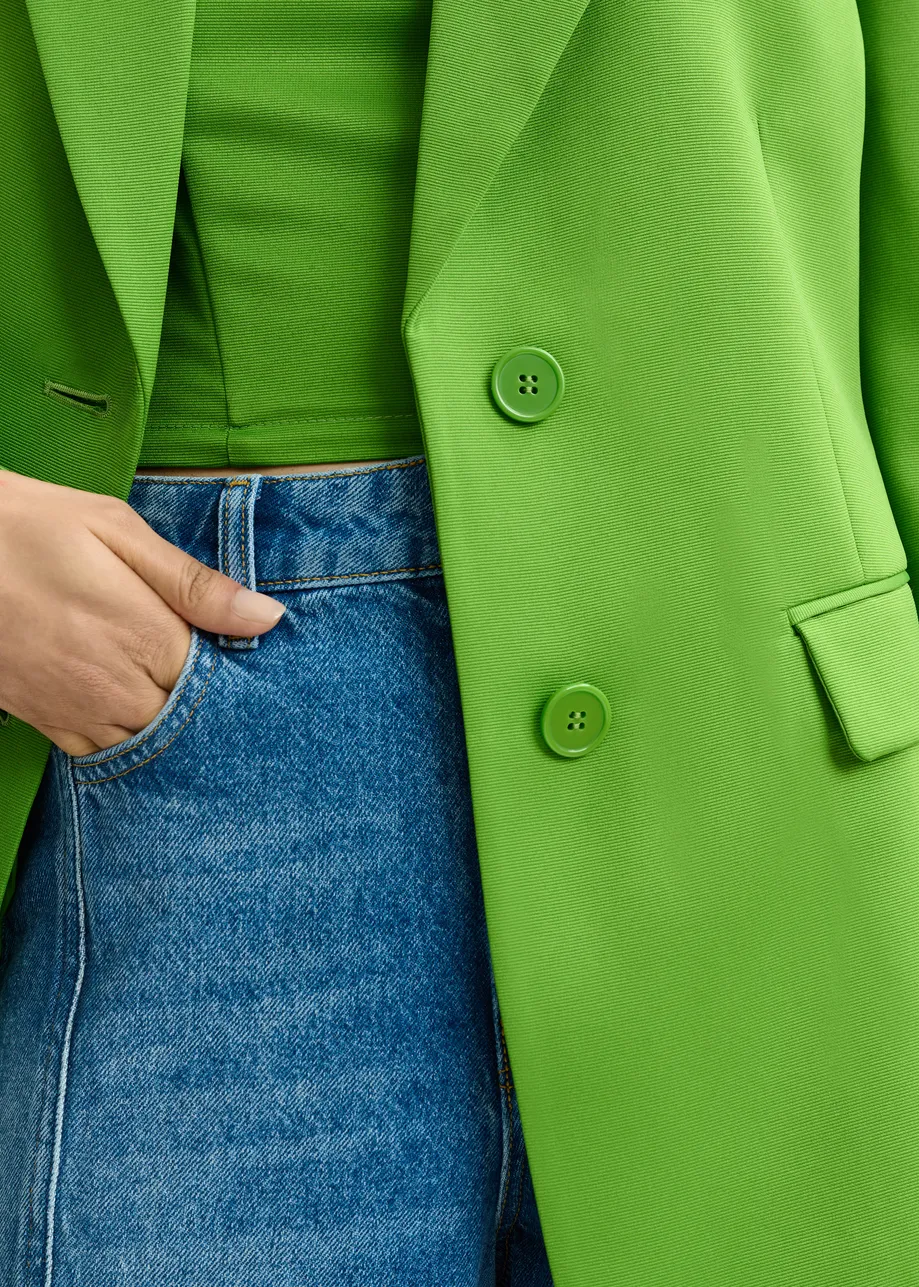 Groene blazer met enkele knopenrij