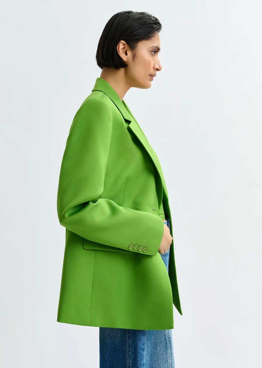 Groene blazer met enkele knopenrij