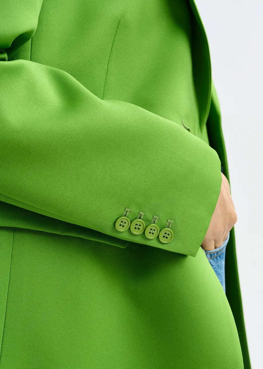 Groene blazer met enkele knopenrij