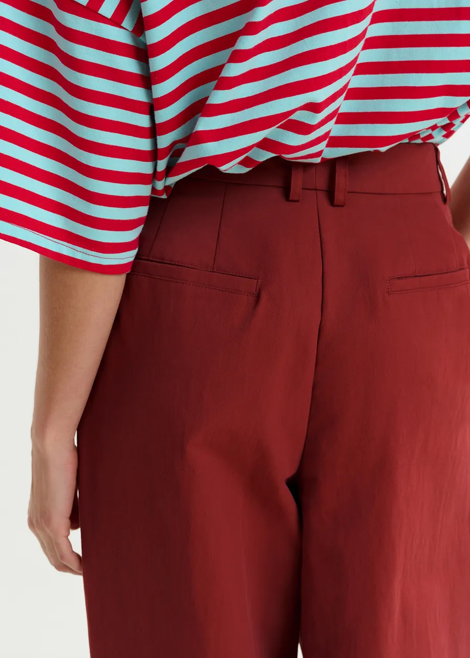 Burned orange pleated wide-leg pants