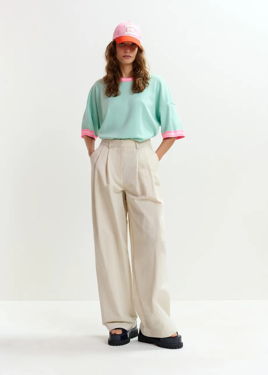 Gebroken witte wijde broek met plooien