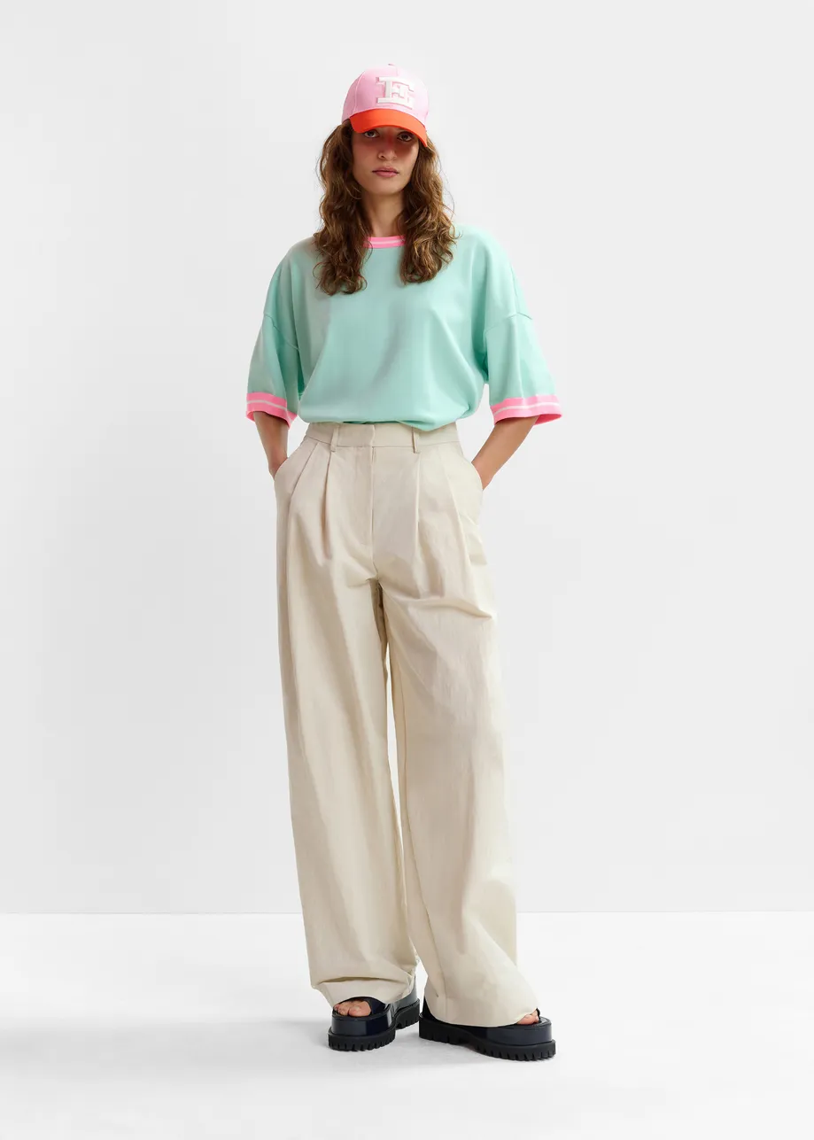 Off-white pleated wide-leg pants