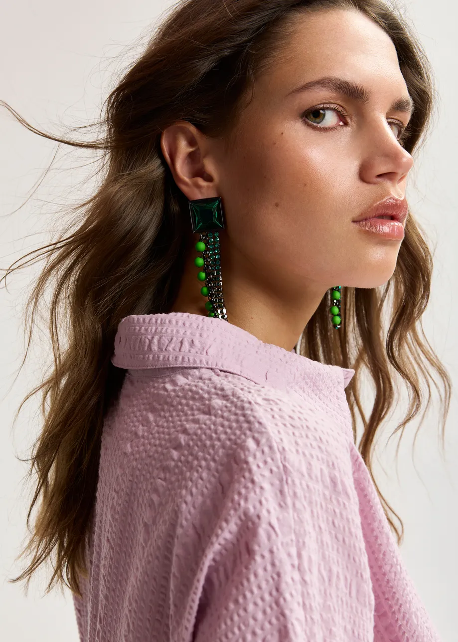 Silver and green stud earrings with rhinestone and bead-embellished chain strands