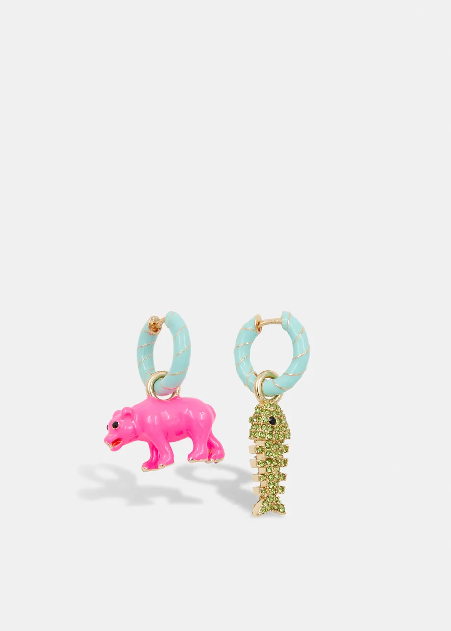 Light blue and gold hoop earrings with bear and fish bone pendants