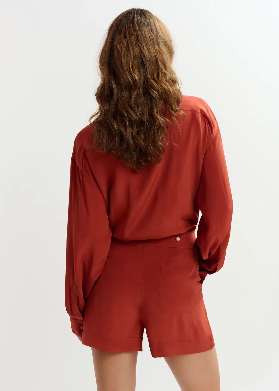 Burned red oversized playsuit with overlay maxi skirt