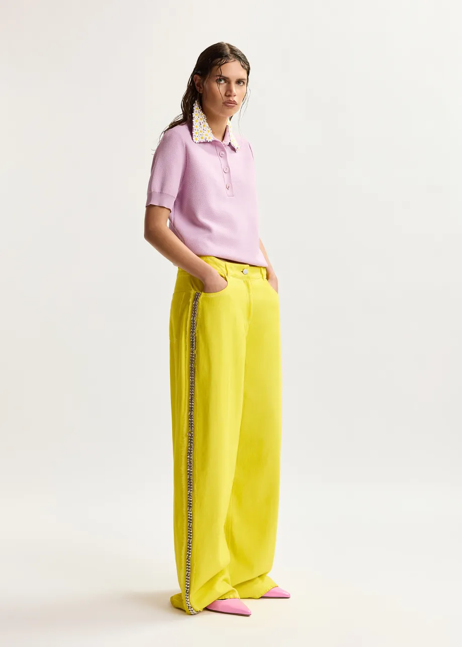 Gele wijde jeans met hoge taille en versierde zijnaden