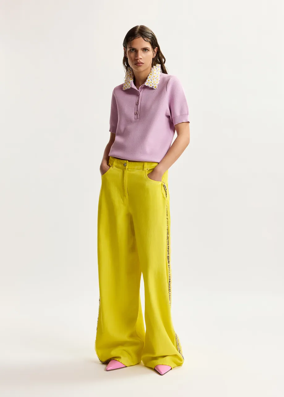 Gele wijde jeans met hoge taille en versierde zijnaden