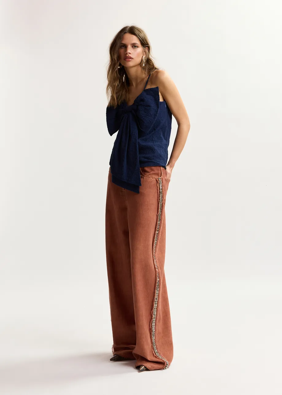 Terracotta wijde jeans met hoge taille en versierde zijnaden