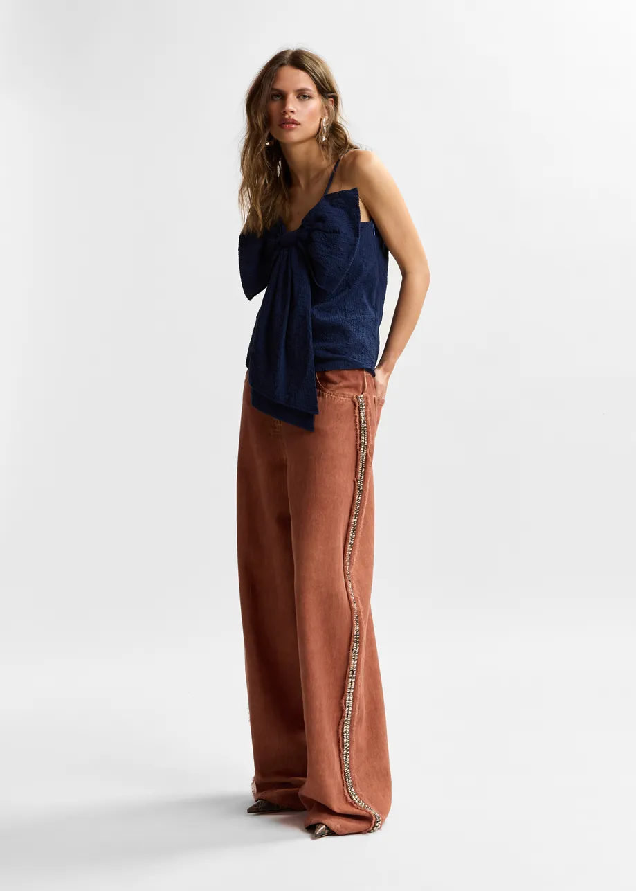 Terracotta high-rise wide-leg jeans with embellished side trims