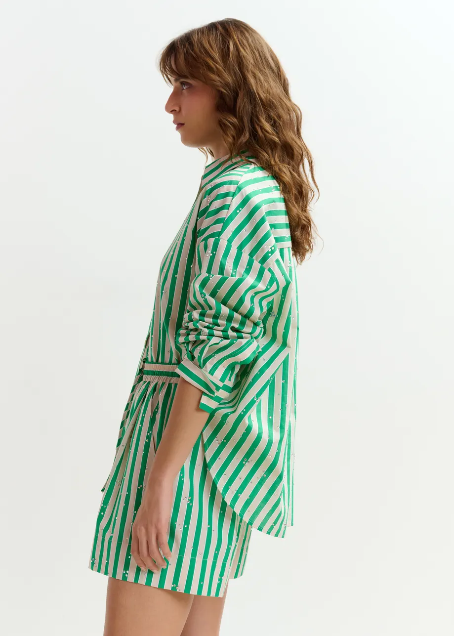 Green and cream striped shorts with rhinestone embellishments
